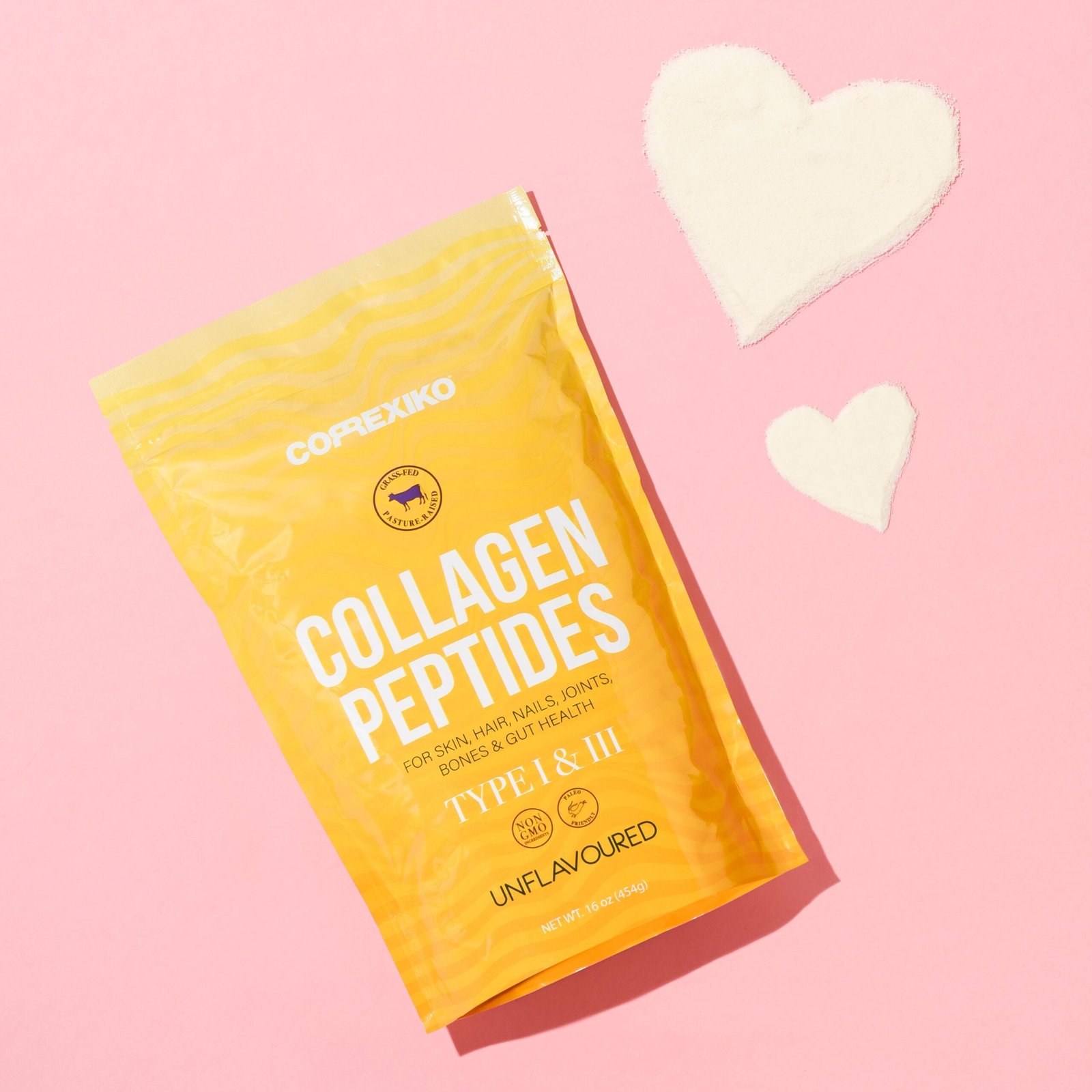 Brightly packaged collagen peptides in a vibrant pink setting. Perfect for product showcases.